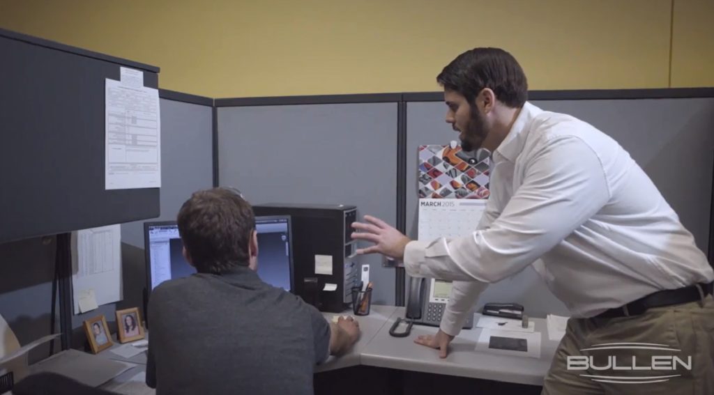 bullen engineers brainstorming at a computer