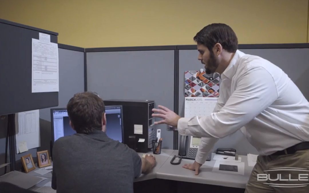 bullen engineers brainstorming at a computer
