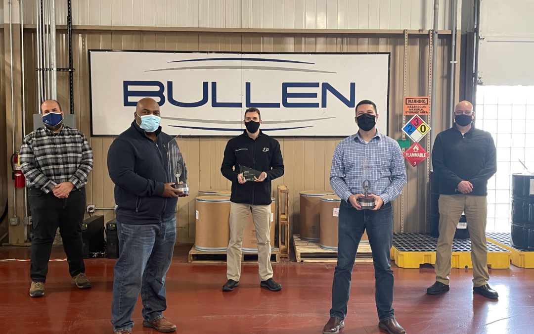 masked bullen employees in warehouse